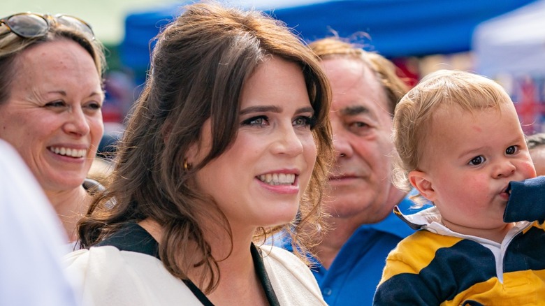 Closeup of Princess Eugenie smiling in crowd