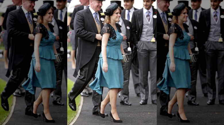 Princess Eugenie wearing a teal dress and black hat at the 2012 Royal Ascot