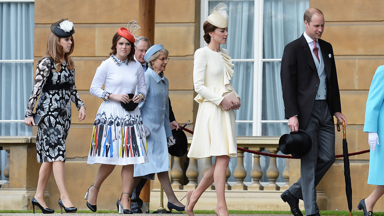 Princess Beatrice and Princess Eugenie walking behind Kate Middleton and Prince William (2016)