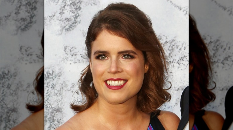 Princess Eugenie smiling and wearing dark lipstick at the 2018 Serpentine Summer Party