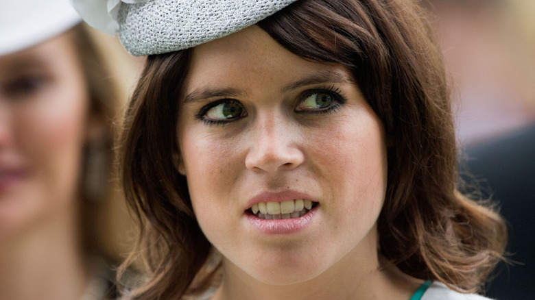 Princess Eugenie gazing to side at the 2013 Ladies Day at Royal Ascot