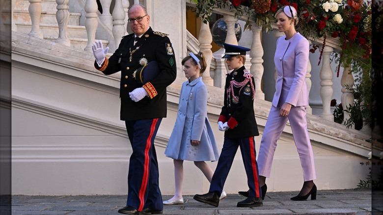 Prince Albert and his family walking together on National Day 2024