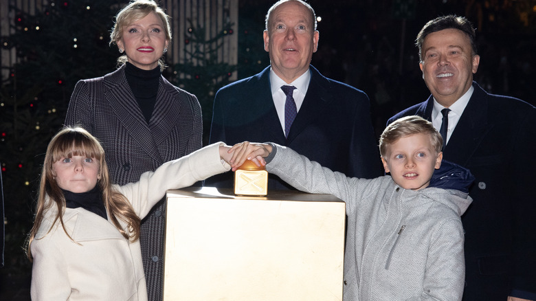 The Monegasque royal family posing at the Casino illumination in Monte Carlo