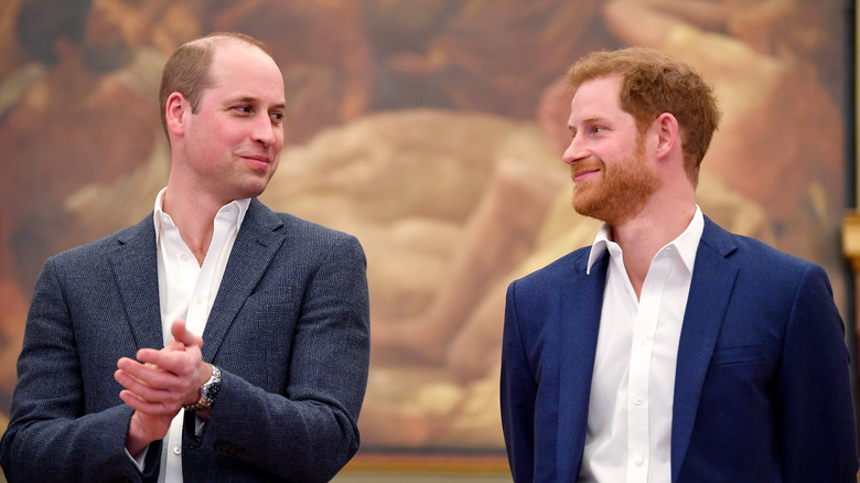 Harry and William looking at each other 