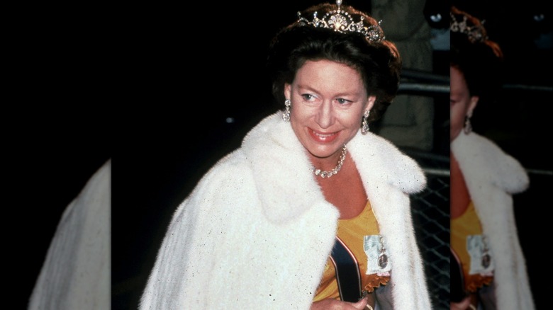 Princess Margaret at an event, smiling and walking