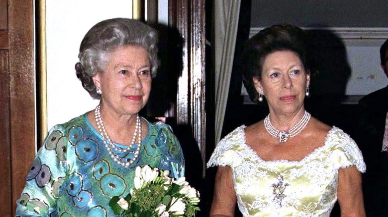 Princess Margaret and Queen Elizabeth II posing 