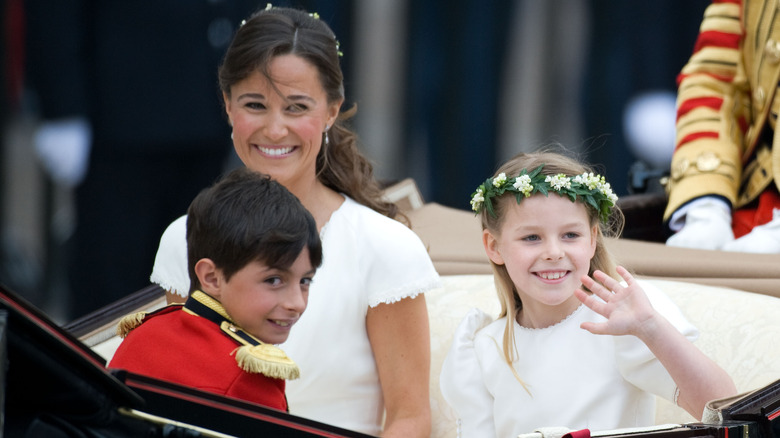 Pippa Middleton with kids in carriage at royal wedding