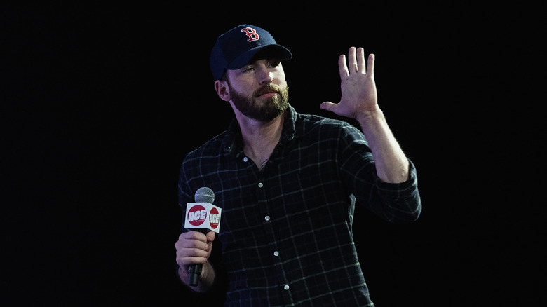 Chris Evans waving at an event