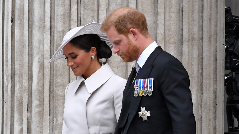 Meghan and Harry posing