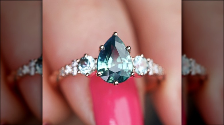 green teardrop cut sapphire ring