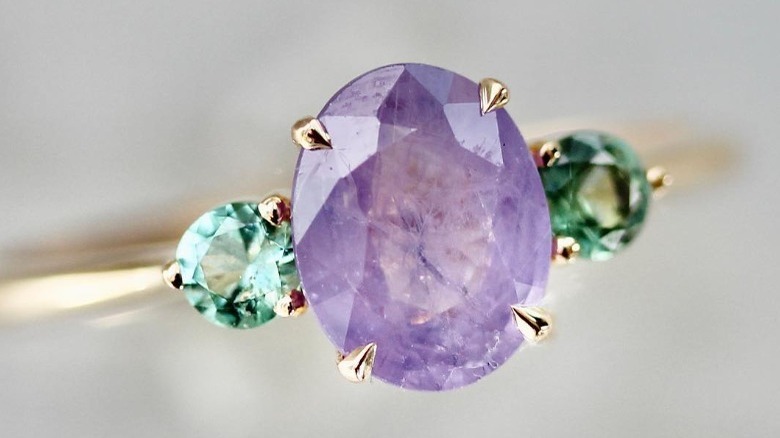 purple and green sapphire ring