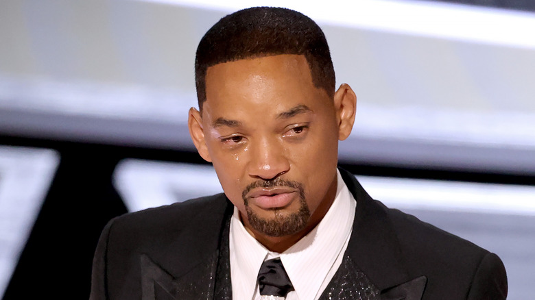 Will Smith crying onstage at the Academy Awards