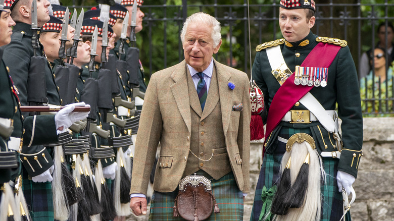 King Charles walking past soldiers