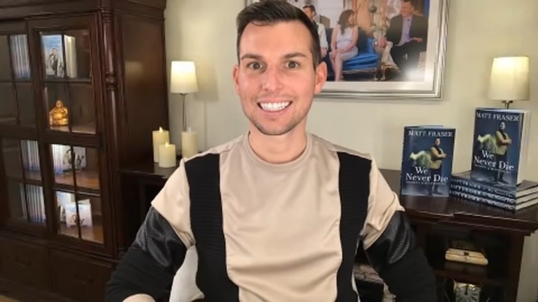 Matt Fraser posing with his new books