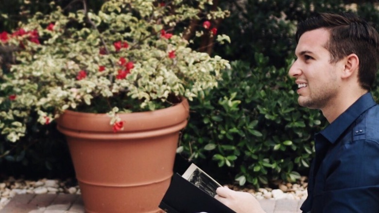 Matt Fraser outside with tablet