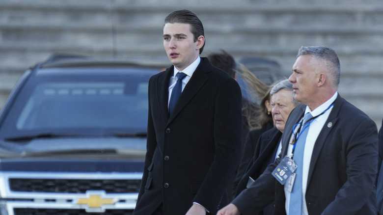 Barron Trump walking