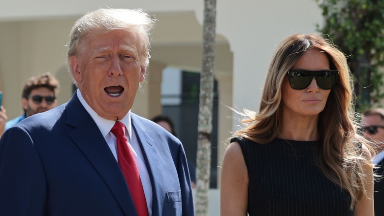 Donald Trump talking beside Melania Trump