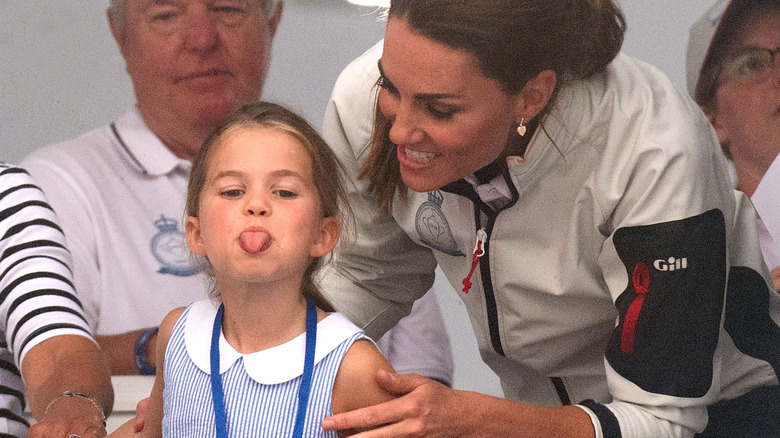 Princess Charlotte sticks her tongue out