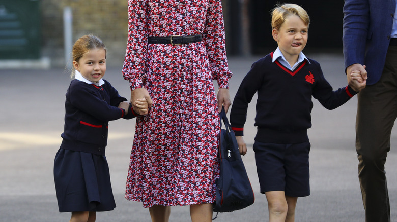 Prince George and Princess Charlotte walking