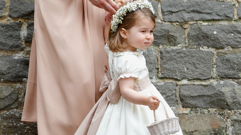 Princess Charlotte and her bother at a wedding 