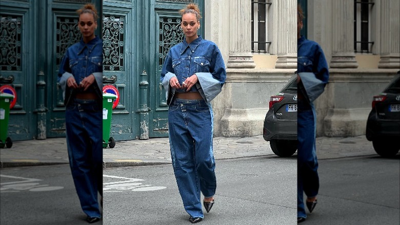 Woman wearing denim and pumps