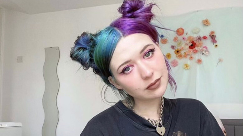 Woman with grunge space buns