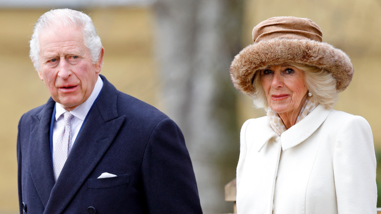 King Charles III and Queen Consort Camilla walking together