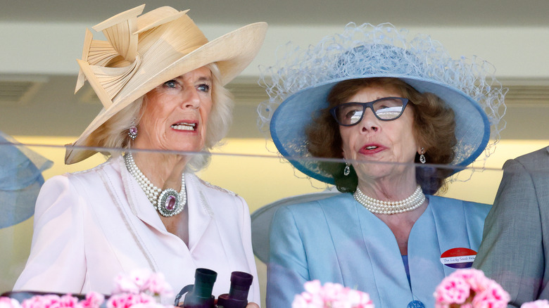 Camilla, Queen Consort, talking to a lady in waiting