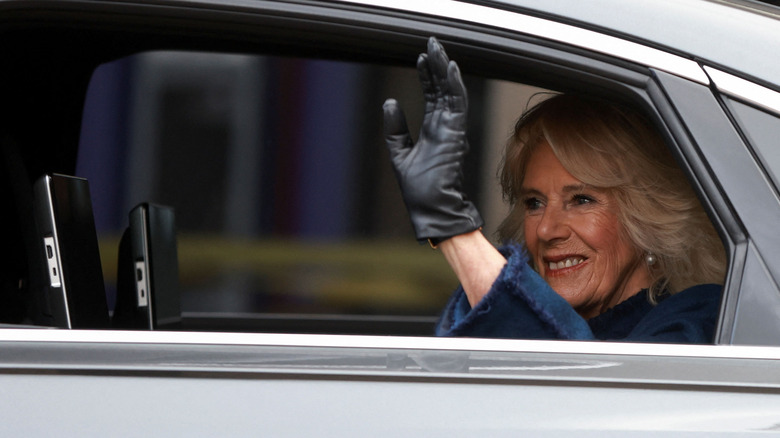 Camilla, Queen Consort, waving from a car 