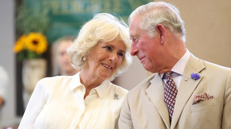 Camilla Parker Bowles and King Charles III posing 