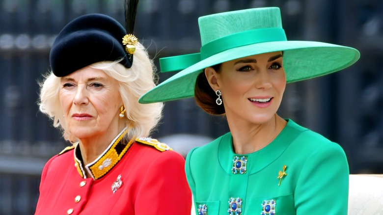 Queen Camilla frowning, Kate Middleton smiling