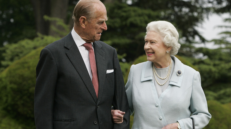 Queen Elizabeth and Prince Philip pose for a photograph