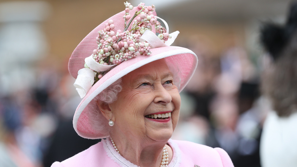 Queen Elizabeth smiling at party