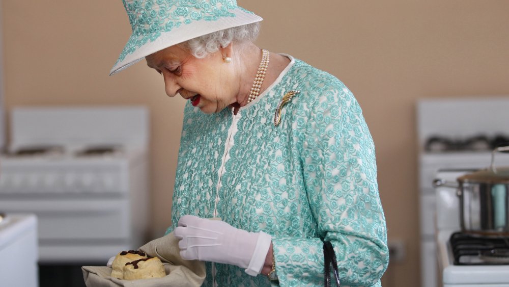 Queen Elizabeth with a scone