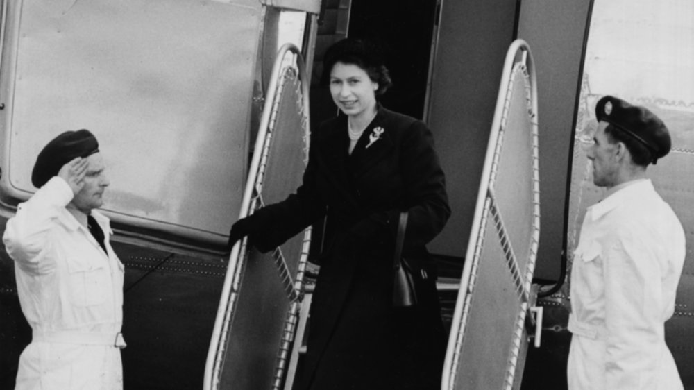 Queen Elizabeth departing a plane in 1952