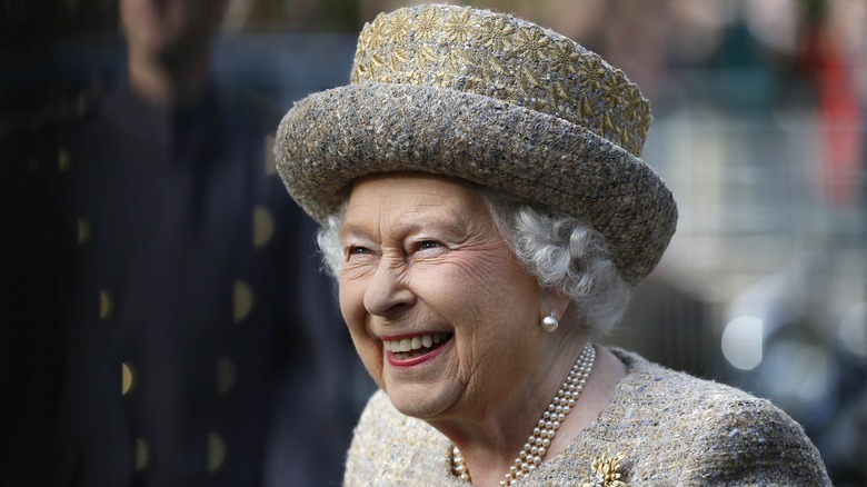 Queen Elizabeth laughs