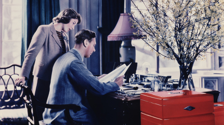 Elizabeth and King George VI in his office 