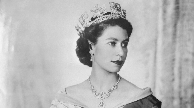 Queen Elizabeth posing in crown