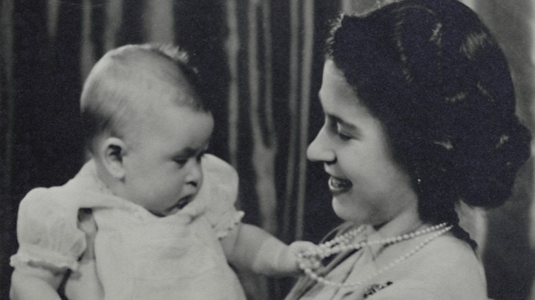 the future king Charles as a tot with his mom, the future queen