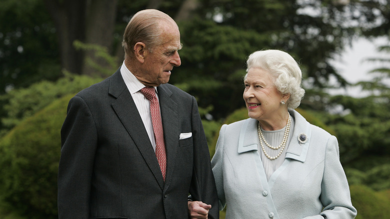 Philip and Elizabeth still gazing lovingly at one another in their golden years