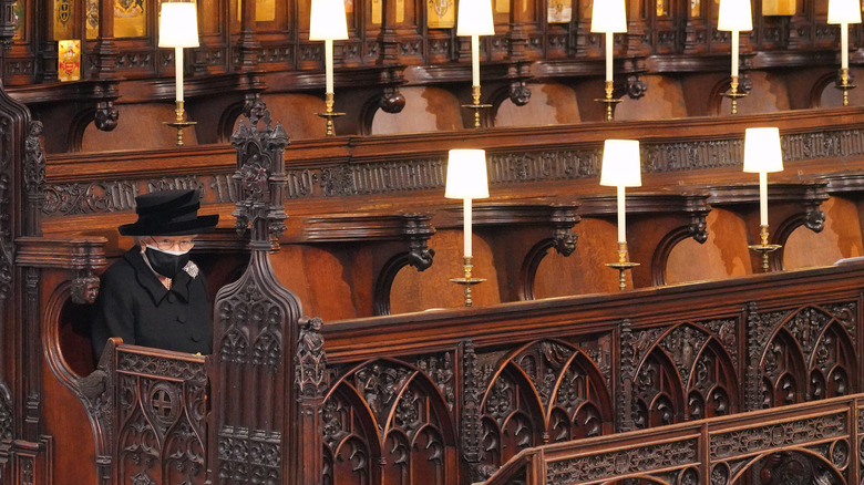 Queen Elizabeth sitting alone at Prince Philip's funeral