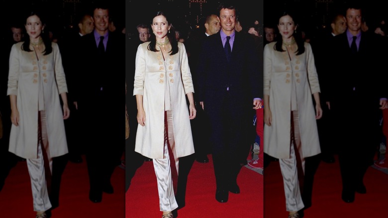 Princess Mary and Prince Frederik of Denmark walking on red carpet