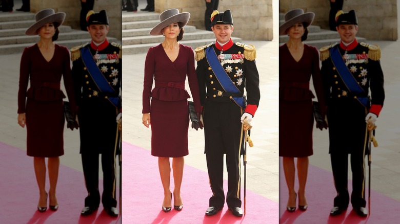 Princess Mary posing in formal dress with Prince Frederik of Denmark in military uniform