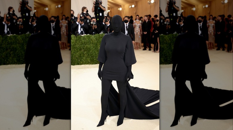Kim Kardashian wearing a black bodysuit