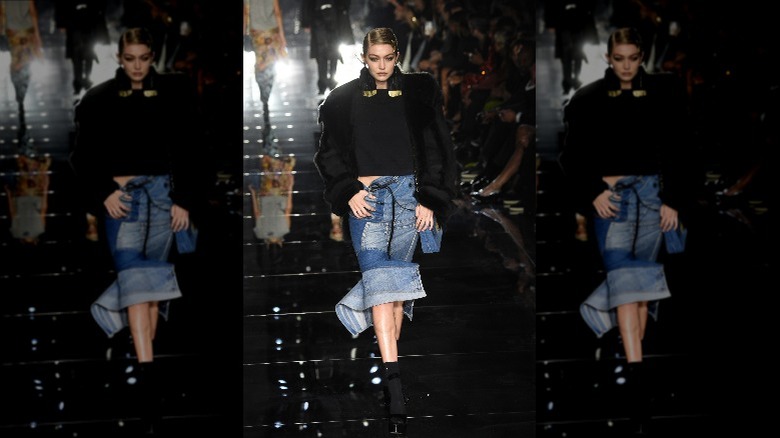 Gigi Hadid modeling patchwork denim skirt