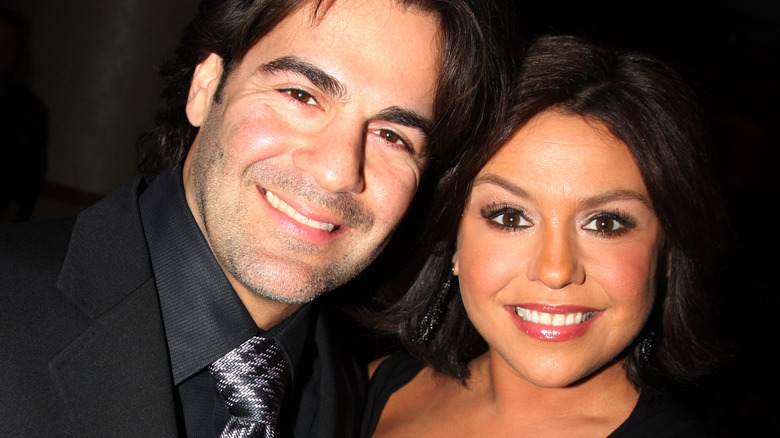 Rachael Ray and her husband, John Cusimano, smiling