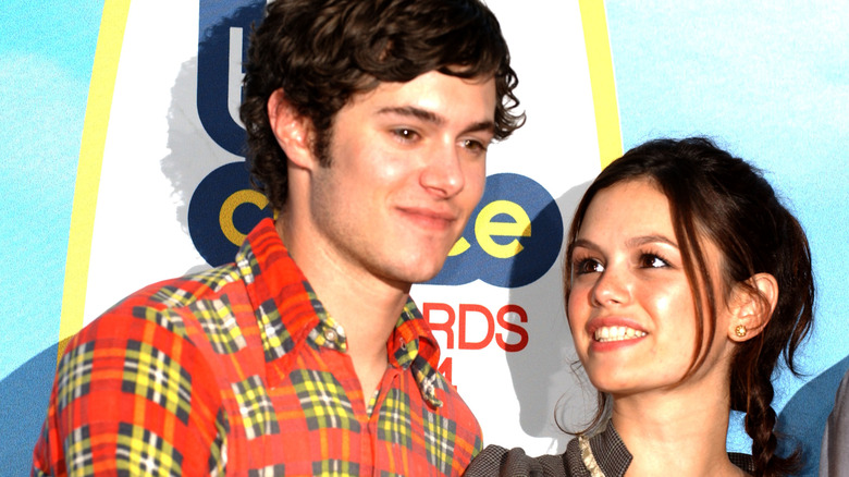 Rachel Bilson looking at Adam Brody and smiling