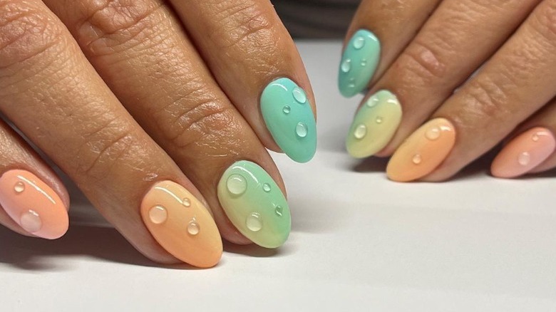 Colorful manicure with raindrop nails