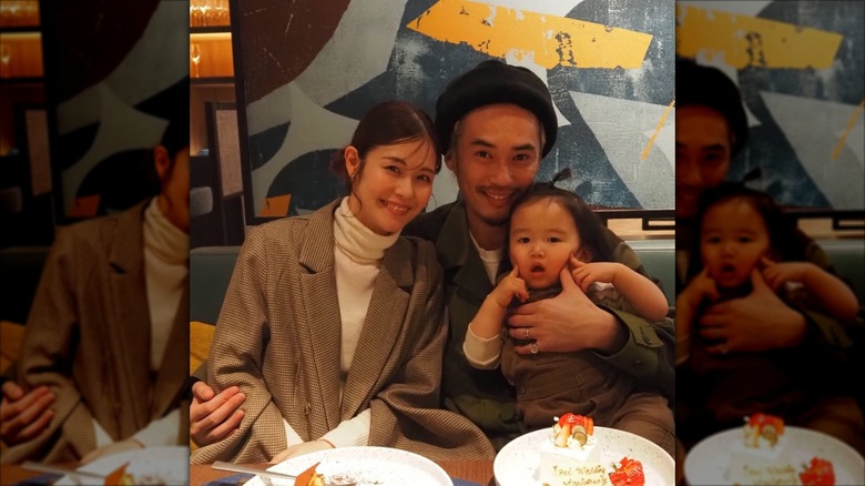 Ryotaro and Motomi at dinner with their baby