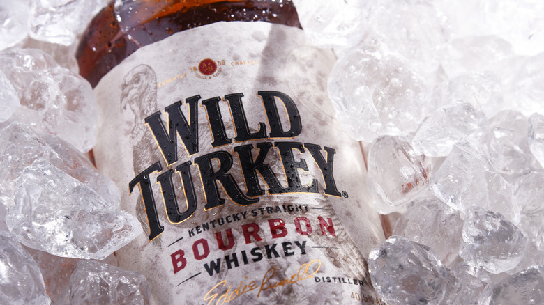 Wild Turkey bourbon bottle in ice